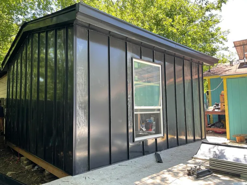 Black standing seam metal wall panels for Roof Inspection in Pasadena